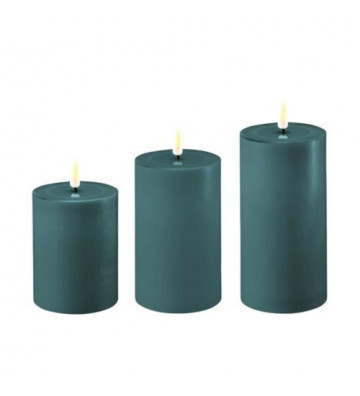 Teal wax candles with...