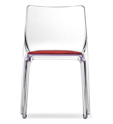 Transparent acrylic chair with red cushion by Pedrali